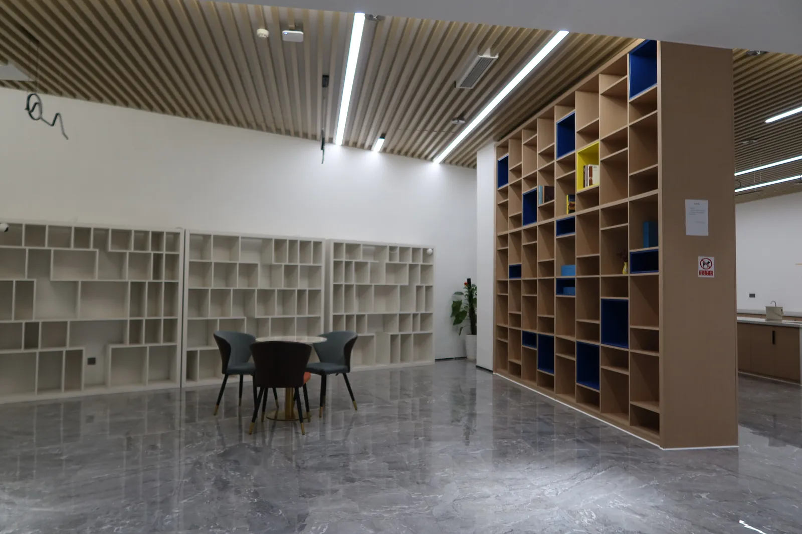 Lounge and shelving area inside the workspace