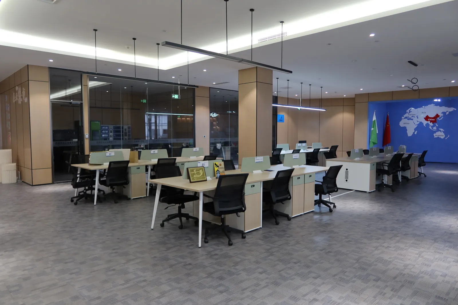 Shared workspace with desks and chairs inside Yazhou Bay International Business Hub